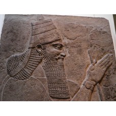 Tiglath-pileser III stele, solar disc bracelet